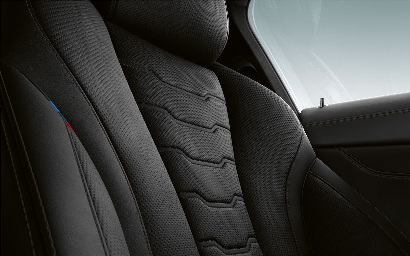 Close-up of upholstery and stitching of the BMW 8 Series Coupé.