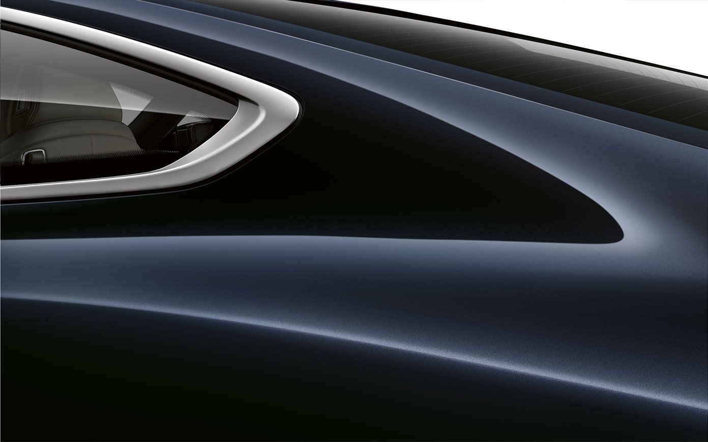 Close-up of the C pillar of the BMW 8 Series Coupé in Carbon Black metallic.