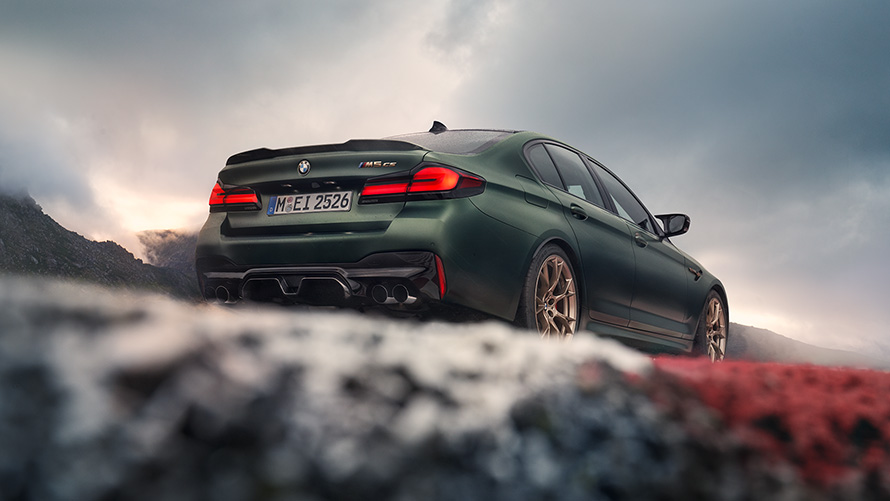 BMW M5 CS F90 2021 Frozen Deep Green metallic rear view low angle shot 