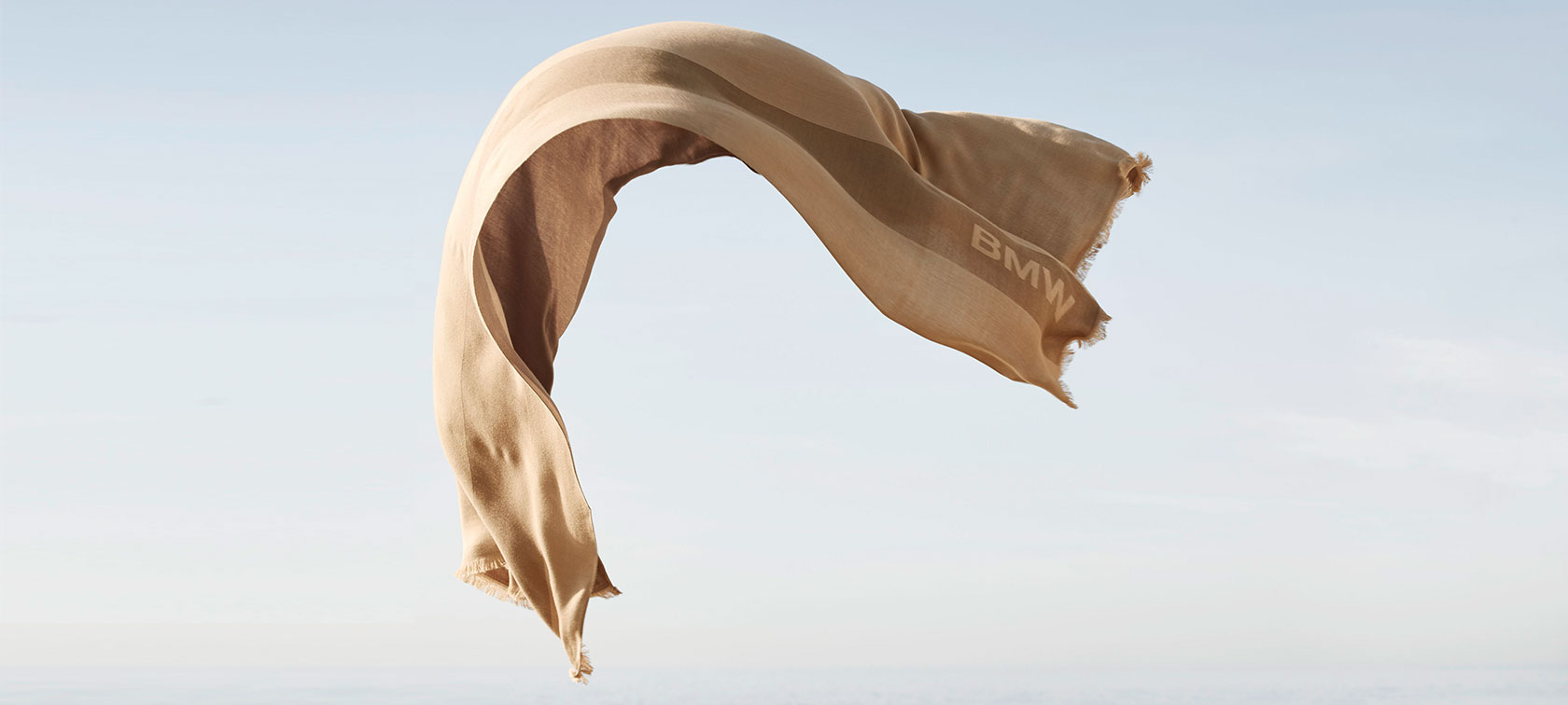 The BMW Summer Scarf is fluttering in the wind.